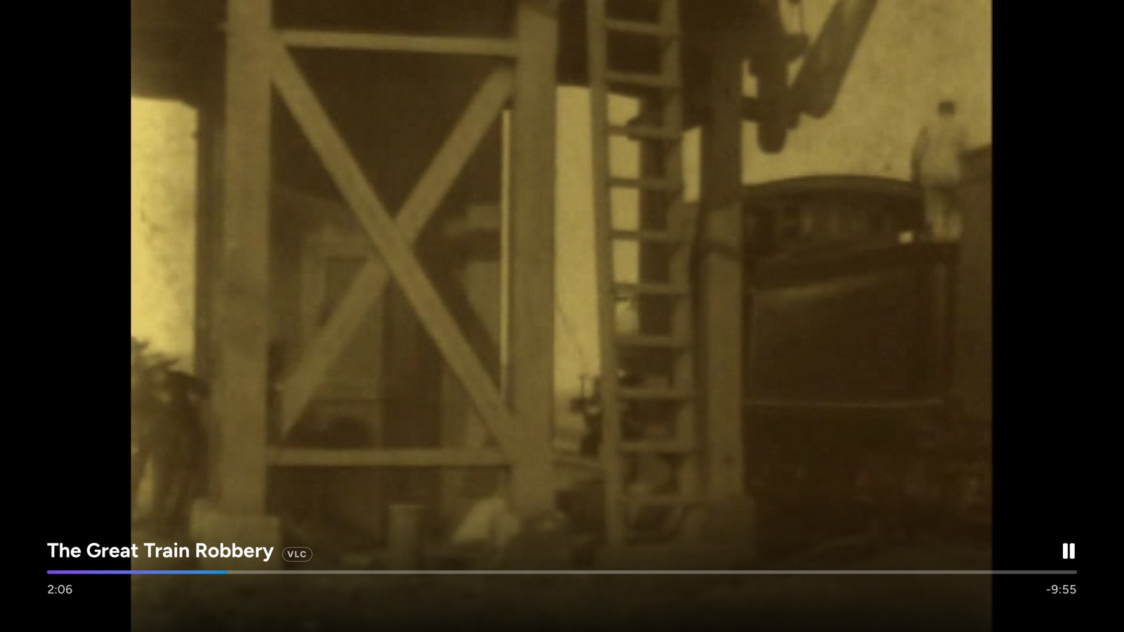 Playback with a minimal overlay showing the title, progress bar and time remaining.